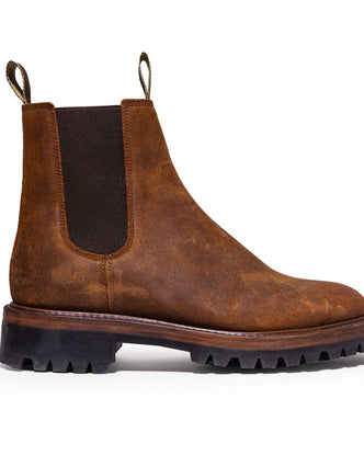studio shot of The Ranch Boot in Redwood Waxed Suede