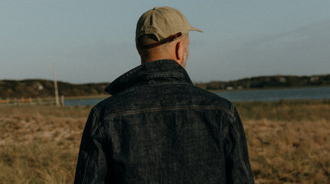 fit model walking wearing the Long Haul Jacket in Rinsed Organic Selvedge