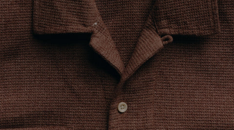 editorial flatlay of The Conrad Shirt in Port Twist