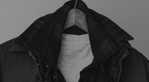 editorial image of various flannels on a hanger