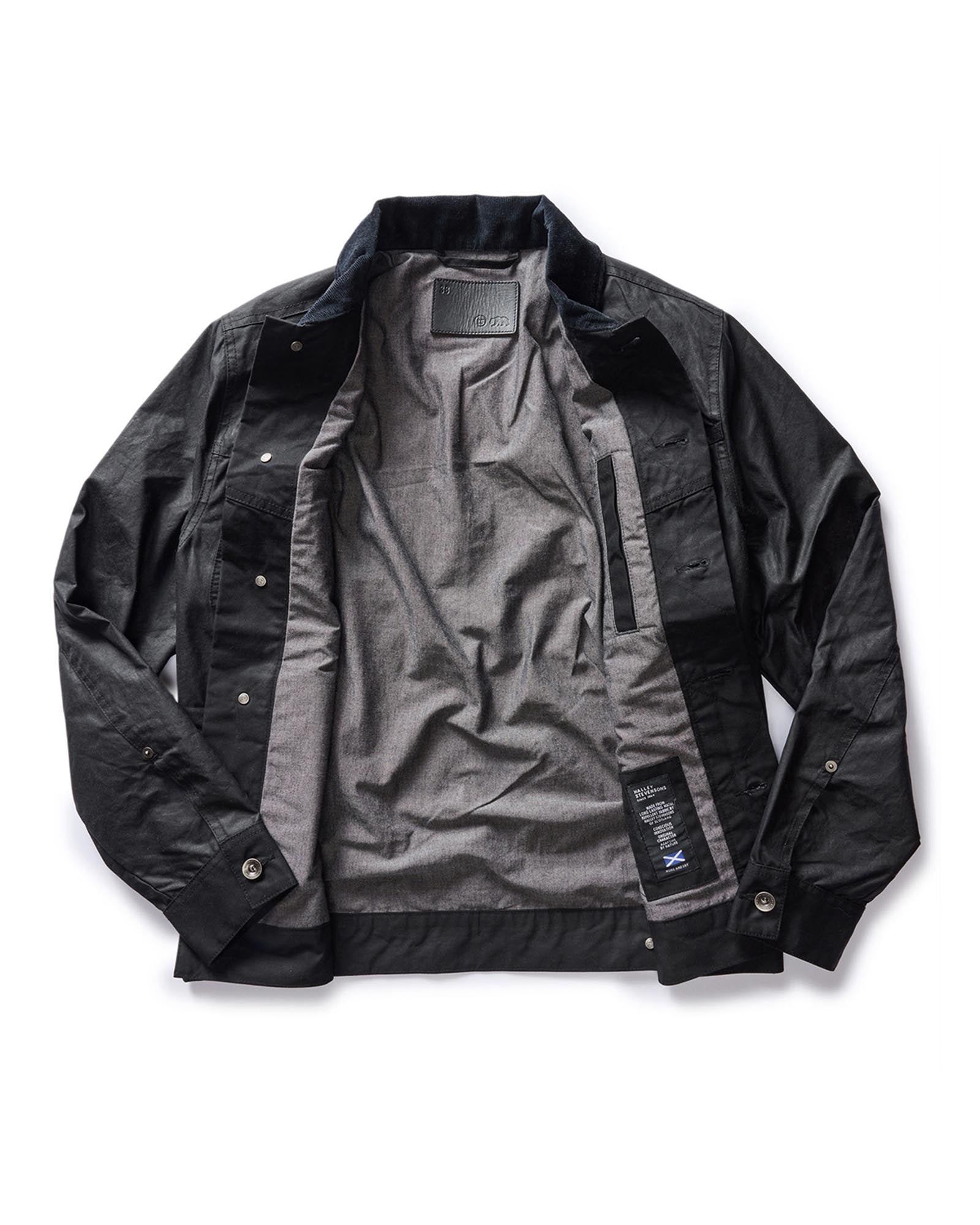 flatlay of the inside of The Long Haul Jacket in Coal Waxed Canvas, Outerwear by Taylor Stitch