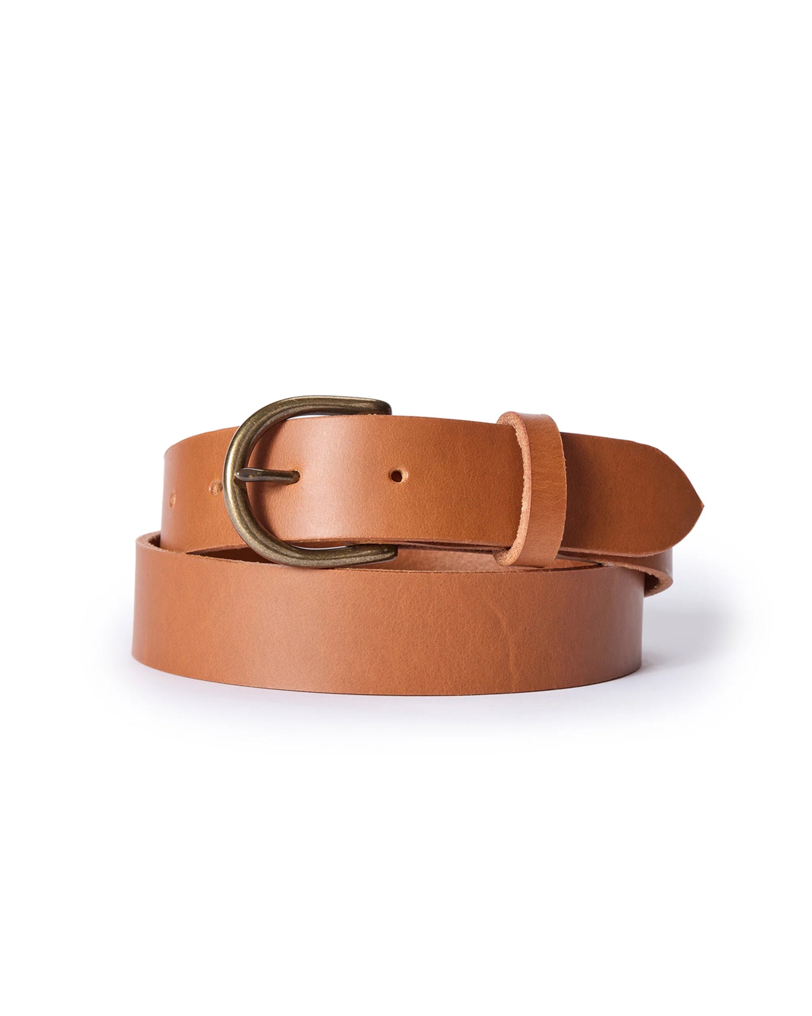 editorial image of The Foundation Belt in Whiskey rolled up, Accessories by Taylor Stitch