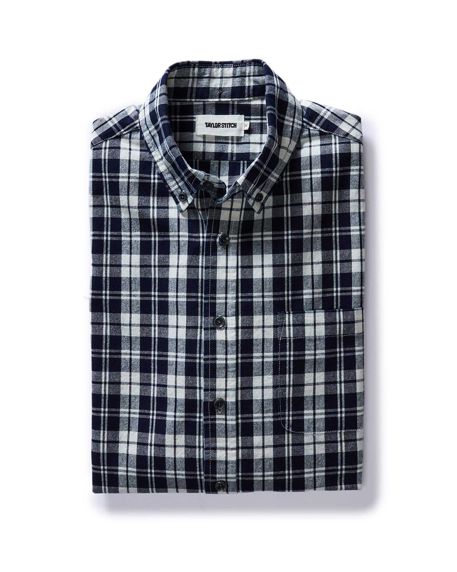 folded flatlay of The Jack in Rinsed Indigo Plaid, Wovens by Taylor Stitch