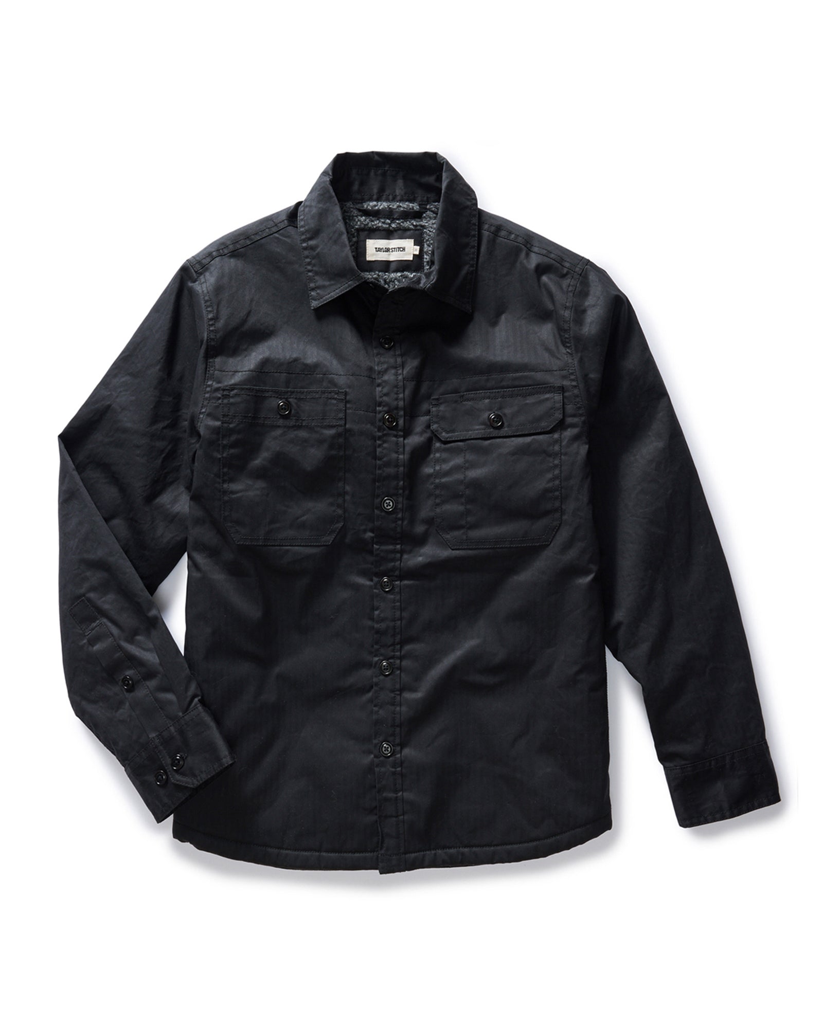 flatlay of The Fender Waxed Canvas Jacket in Coal Dry Wax, Outerwear by Taylor Stitch
