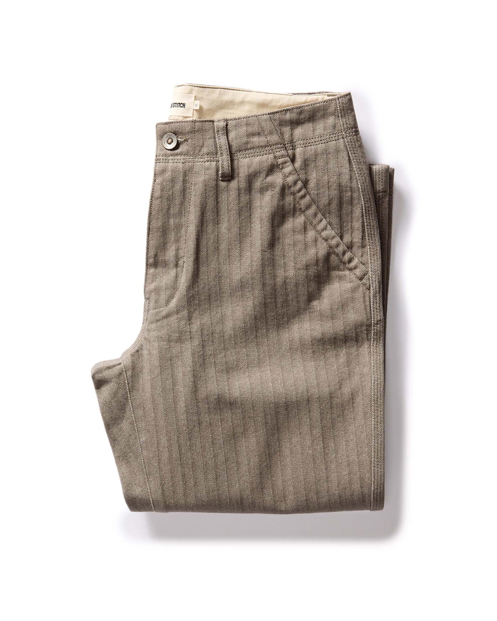 folded flatlay of The Morse Pant in Soil Herringbone, Bottoms by Taylor Stitch
