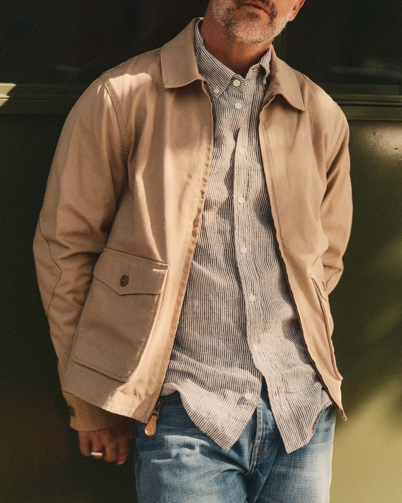 fit model showing off The Airman Jacket in Organic Khaki Foundation Twill, Outerwear by Taylor Stitch