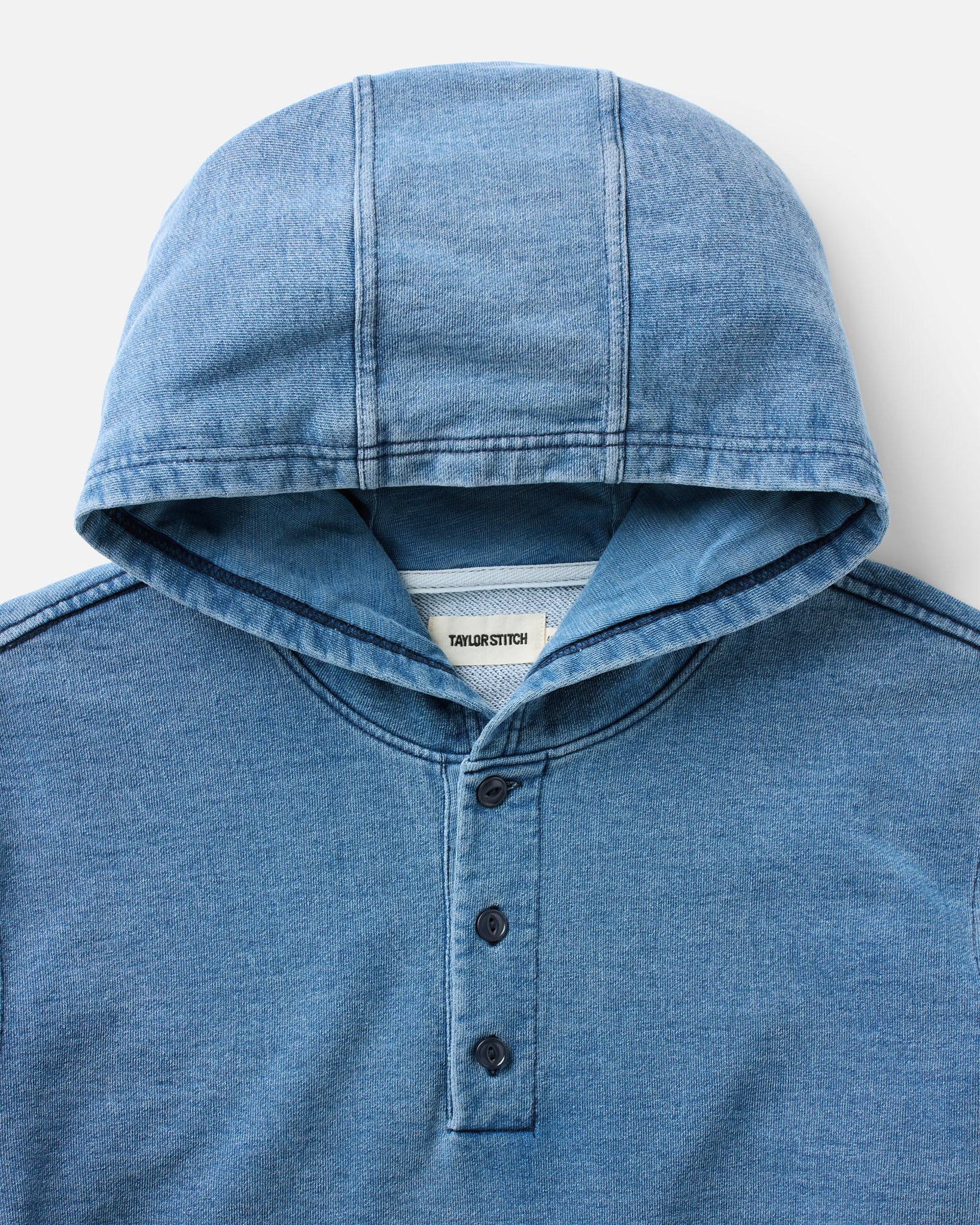 material shot of the hood on The Baja Pullover in Washed Indigo Terry, Knits by Taylor Stitch
