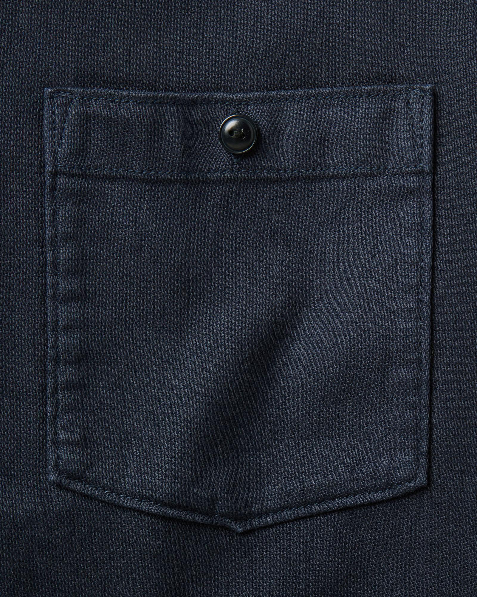 material shot of the pocket on The Dispatch Shirt in Navy Broken Twill, Wovens by Taylor Stitch