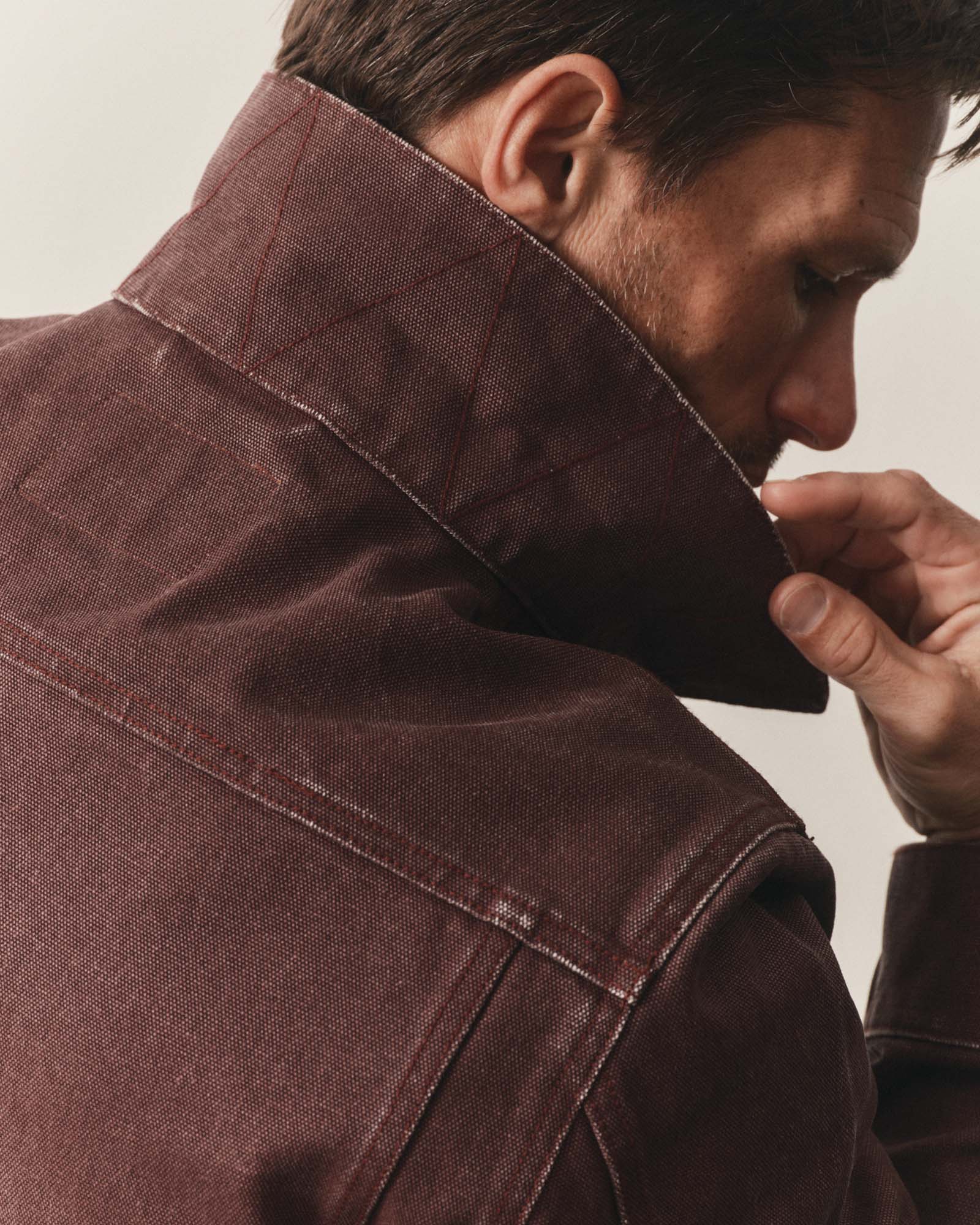 fit model showing off the collar on The Ryder Jacket in Burgundy Chipped Canvas, Outerwear by Taylor Stitch