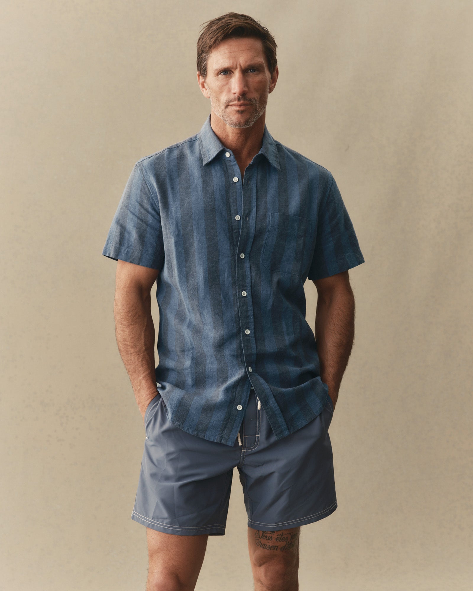 fit model showing off The Short Sleeve California in Blue Stone Stripe Hemp, Wovens by Taylor Stitch