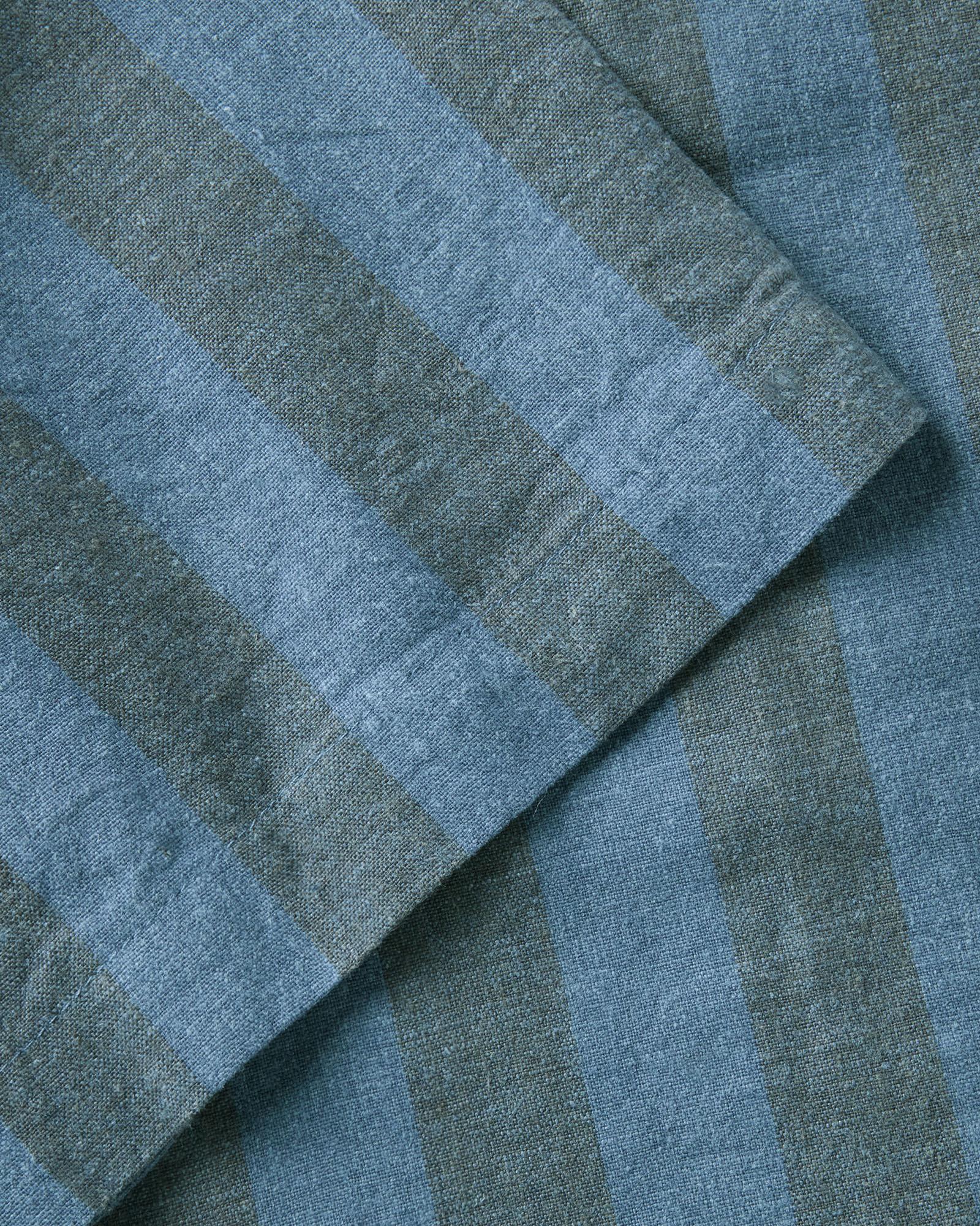 material shot of the sleeve on The Short Sleeve California in Blue Stone Stripe Hemp, Wovens by Taylor Stitch