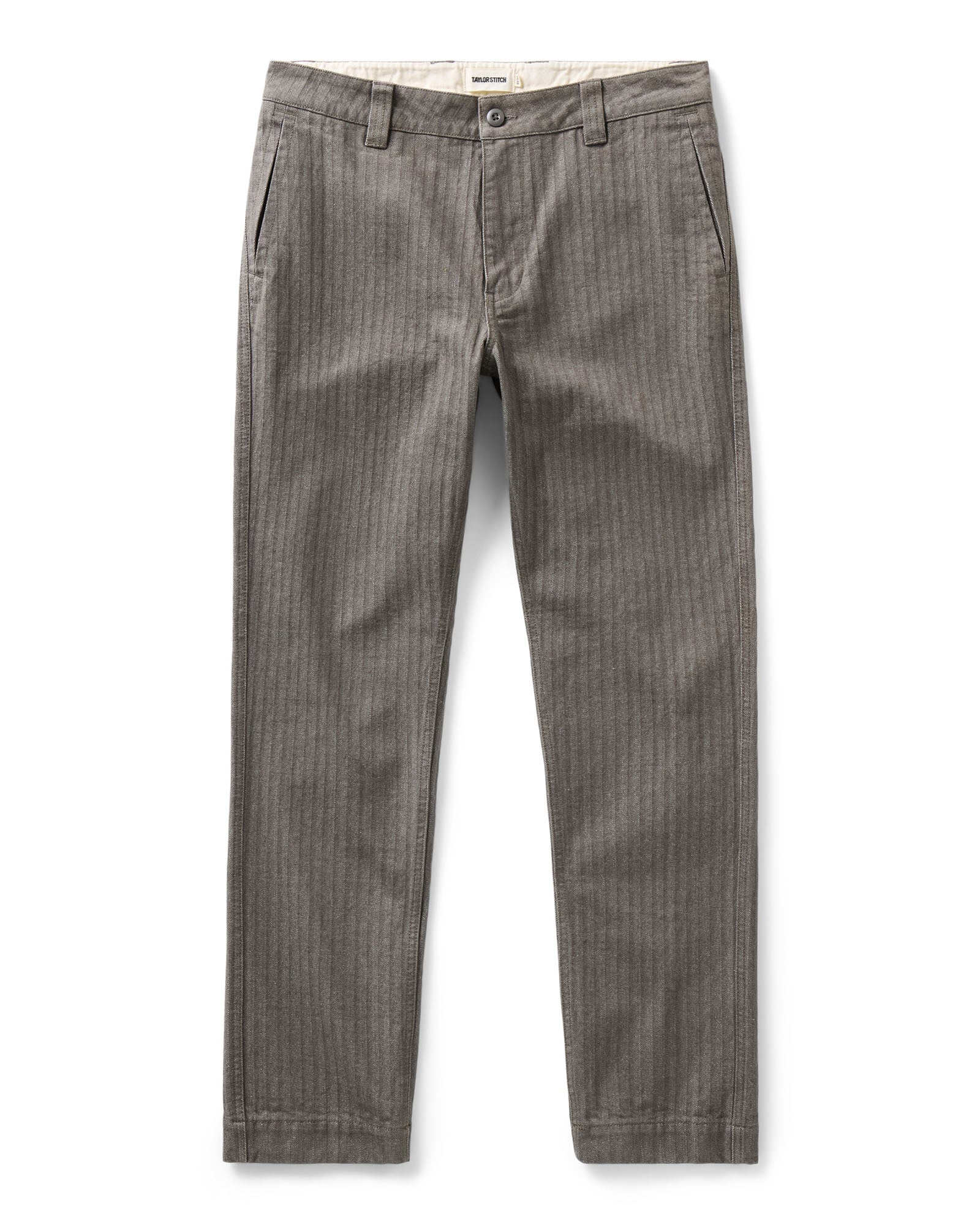 flatlay of The Emlen Pant in Smoked Olive Herringbone, Bottoms by Taylor Stitch
