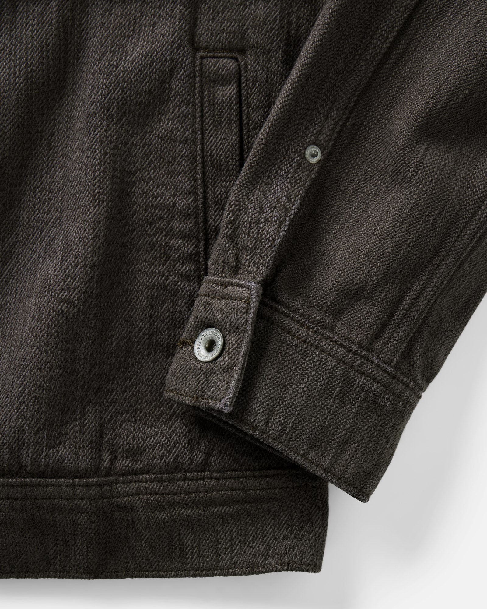material shot of the sleeve on The Long Haul Jacket in Soil Slub Denim, Outerwear by Taylor Stitch