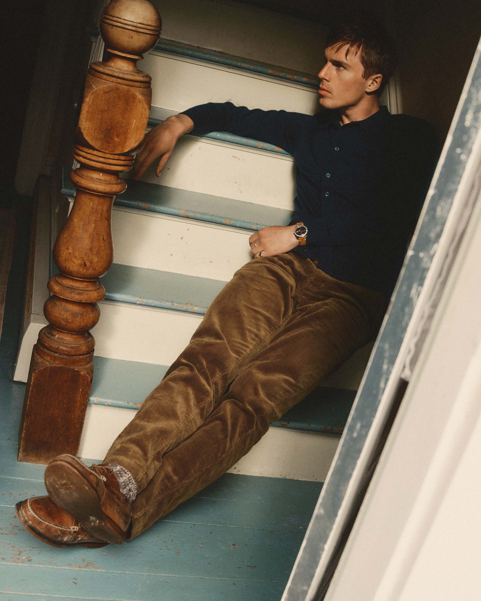 fit model posing in The Nichols Polo in Nocturne Cotton Cashmere, Knits by Taylor Stitch