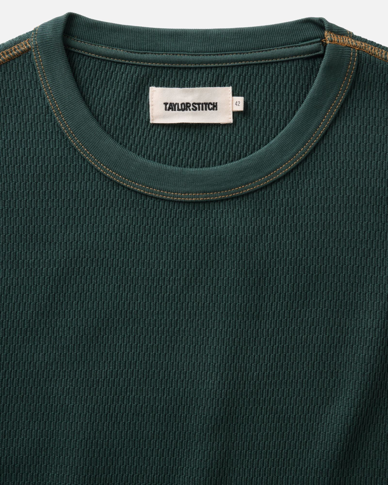 material shot of the collar on The Organic Cotton Crew in Dark Forest Waffle, Knits by Taylor Stitch