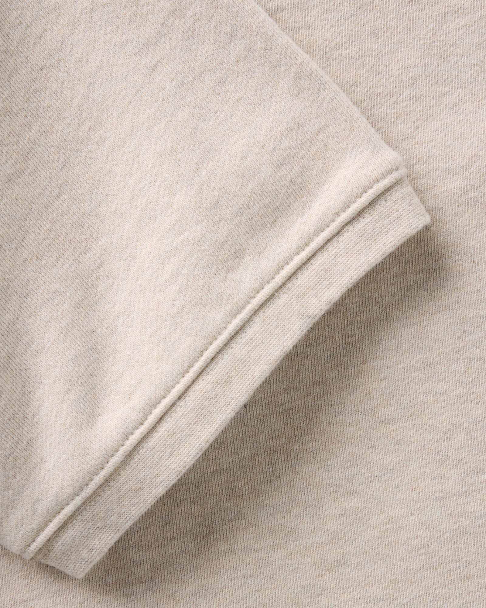 material shot of the sleeve on The Short Sleeve Sunset Crew in Heather Oat Terry, Knits by Taylor Stitch