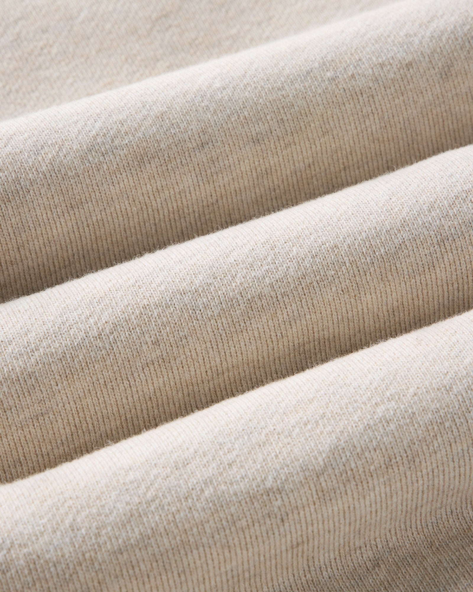 material shot of the fabric on The Short Sleeve Sunset Crew in Heather Oat Terry, Knits by Taylor Stitch