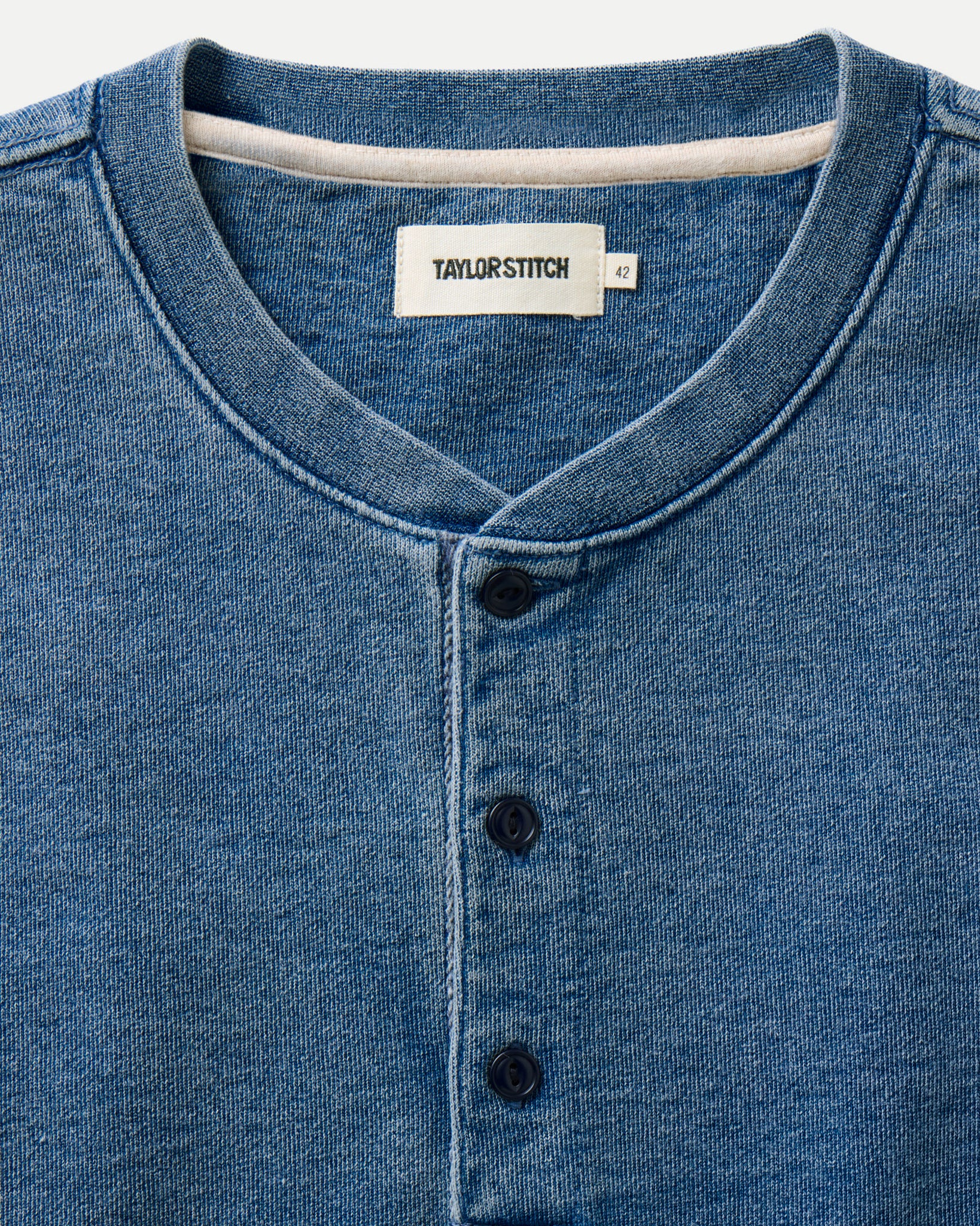 material shot of the collar on The Sunset Henley in Washed Indigo Terry, Knits by Taylor Stitch