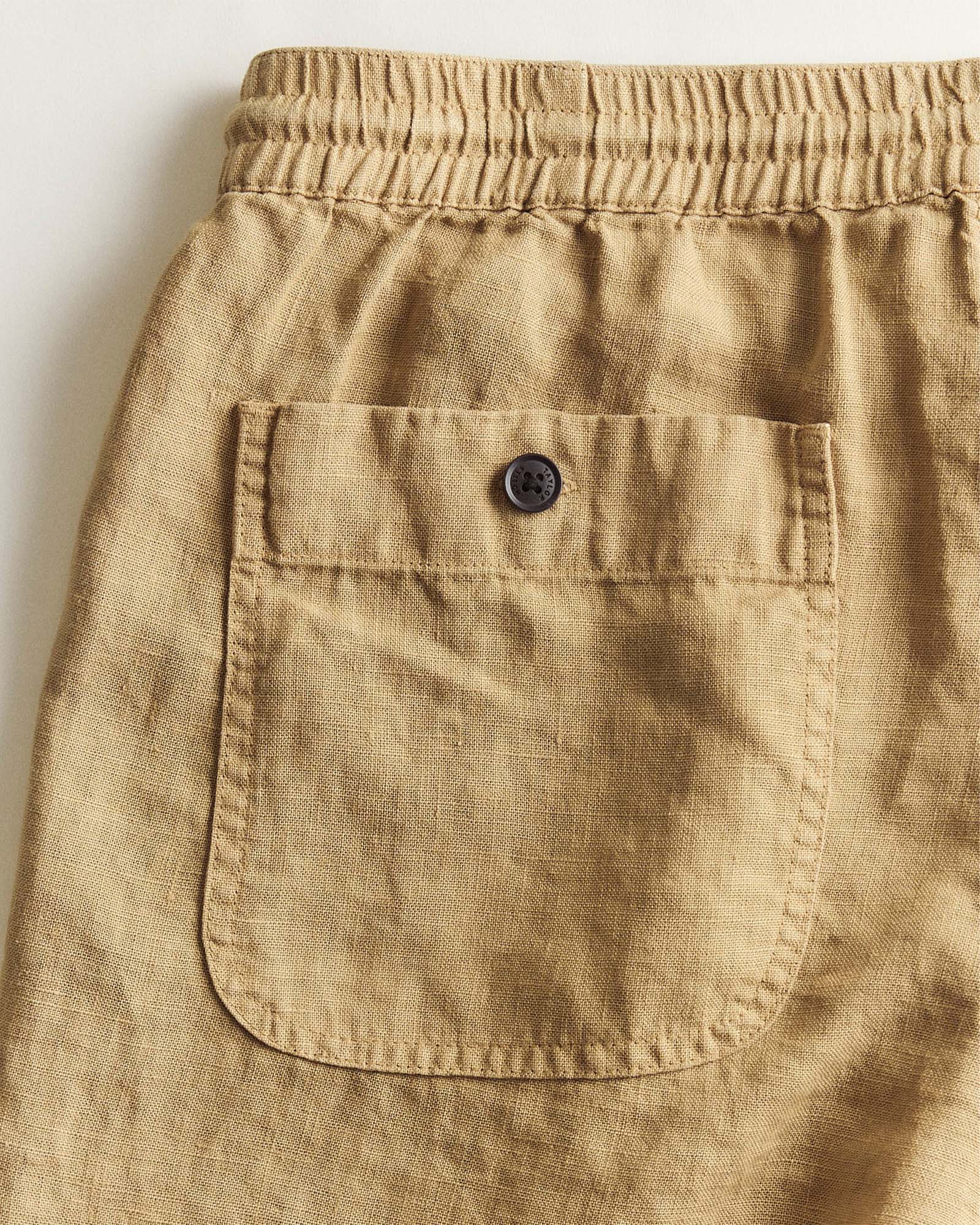 material shot of the back pocket on The Apres Short in Wheat Hemp, Bottoms by Taylor Stitch