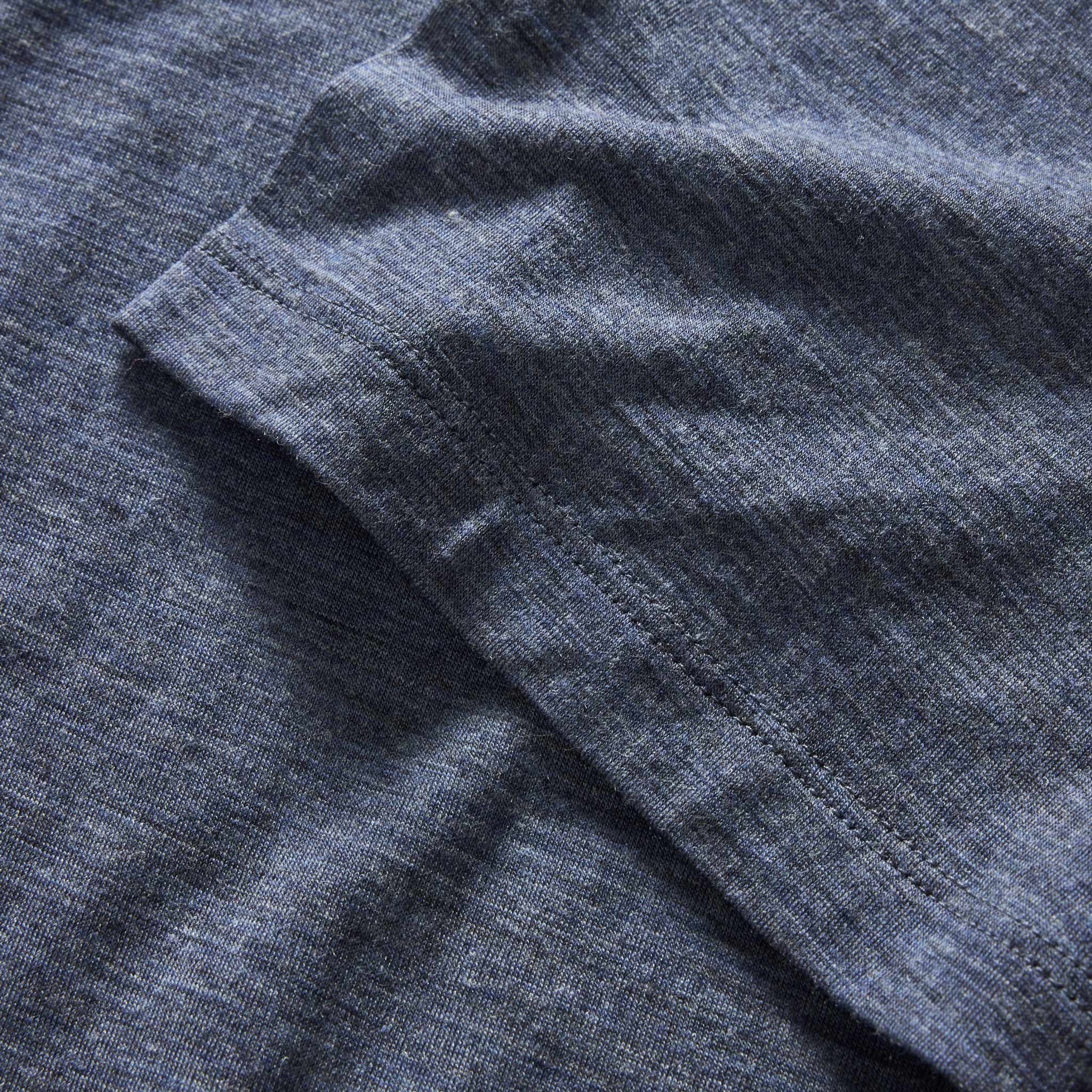 material shot of the sleeve on The Merino Tee in Heather Navy, Knits by Taylor Stitch