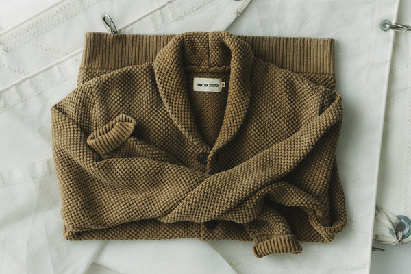 editorial image of The Mariner Cardigan in Heather Loden Slub hanging