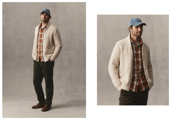 fit model posing in The Fisherman Shawl Cardigan in Heather Coal Merino