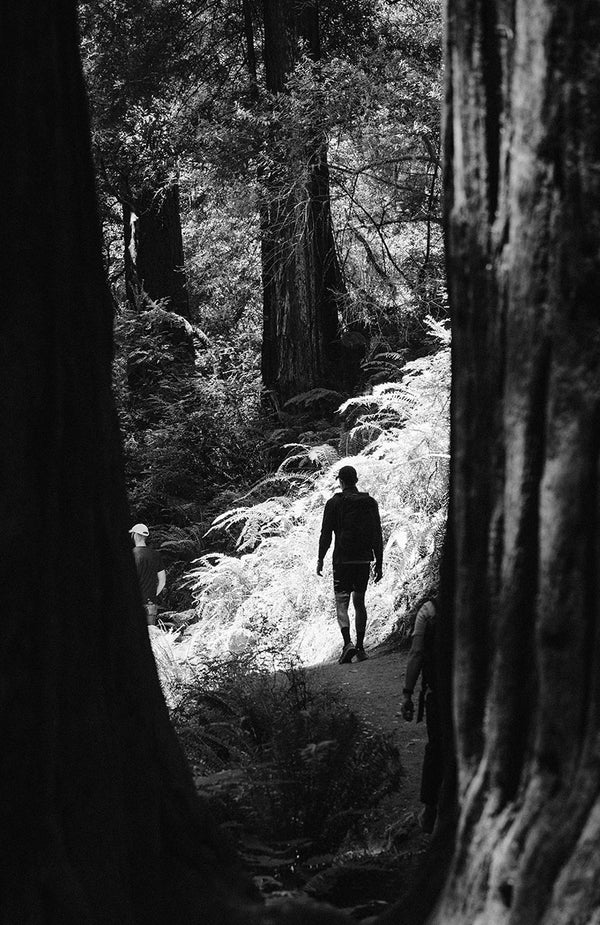 Michael Easter walking down a trail