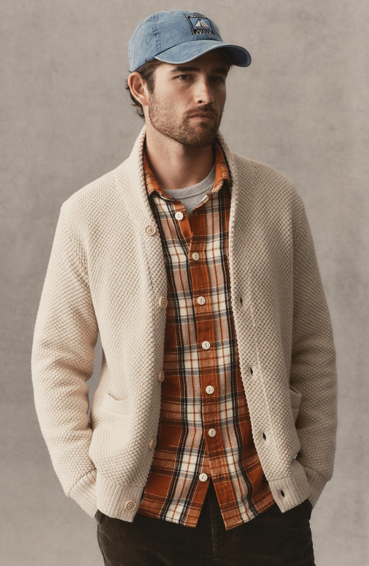 fit model posing in The Crawford Sweater in Marled Natural