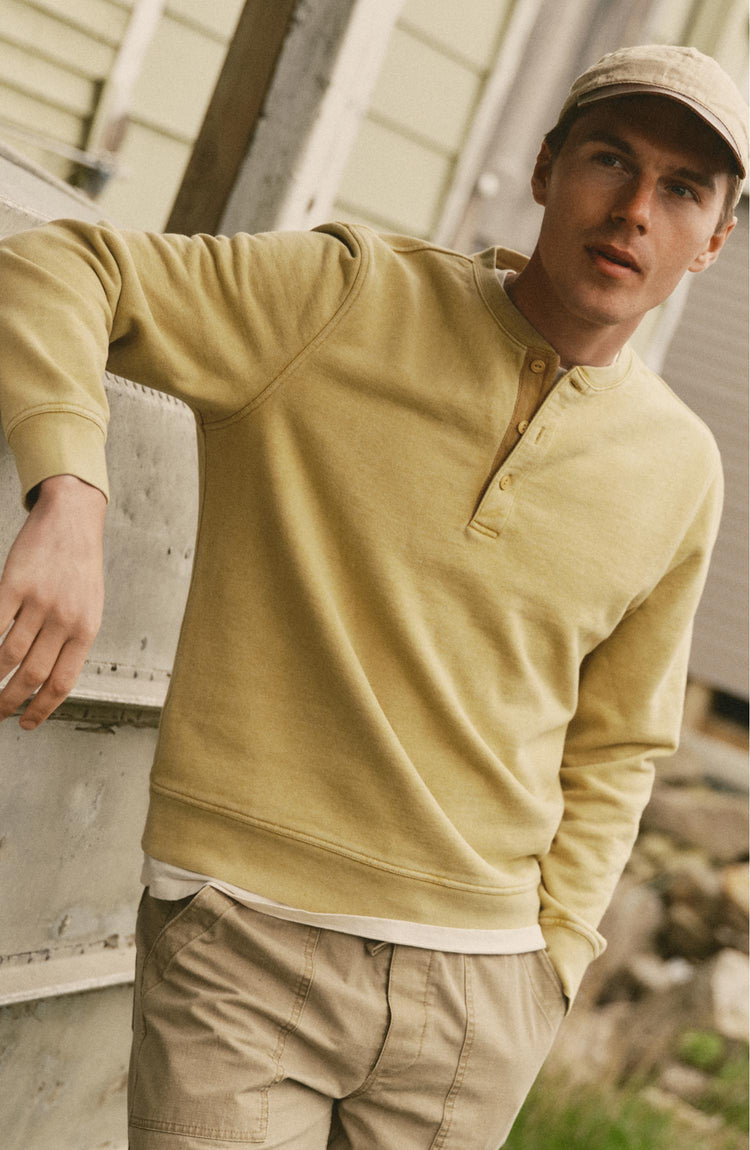 fit model posing in The Sunset Henley in Washed Goldfinch Terry
