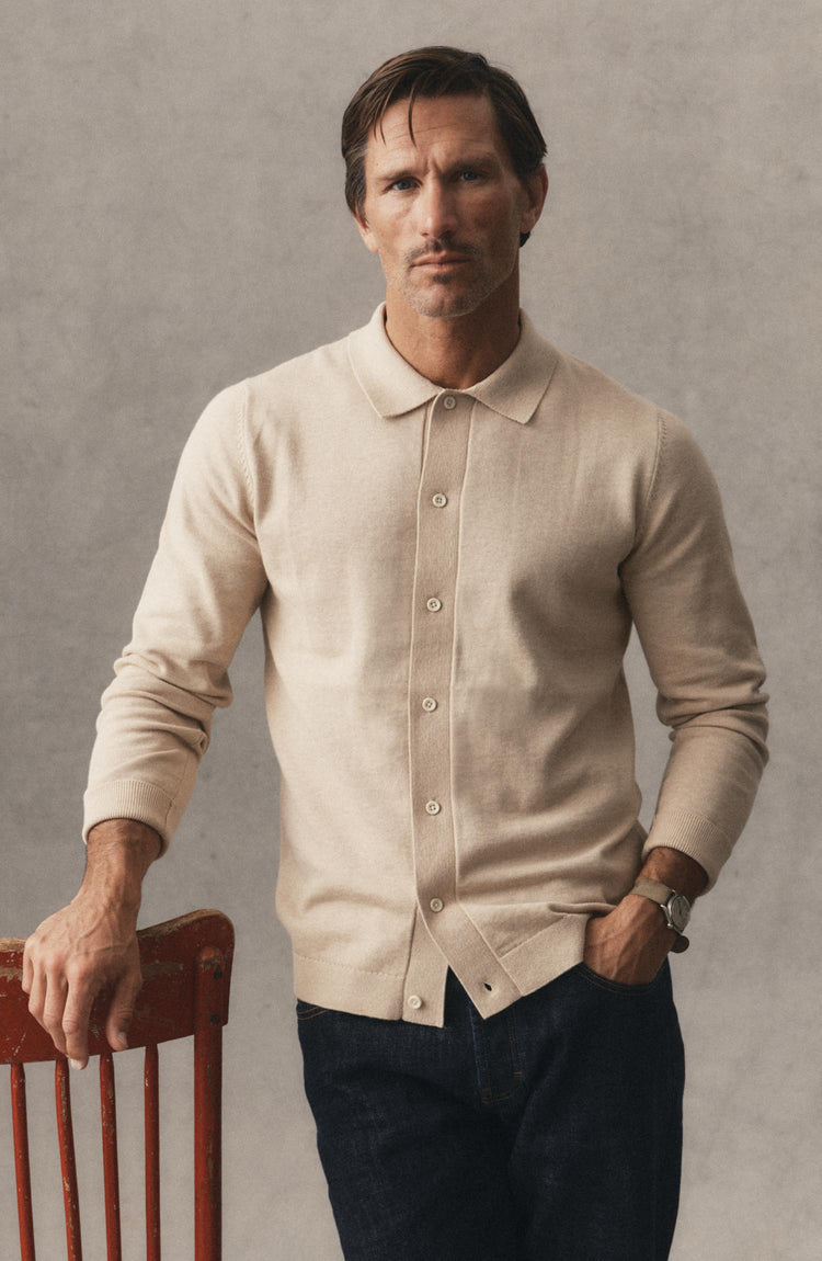fit model posing in The Nichols Polo in Sable Cotton Cashmere