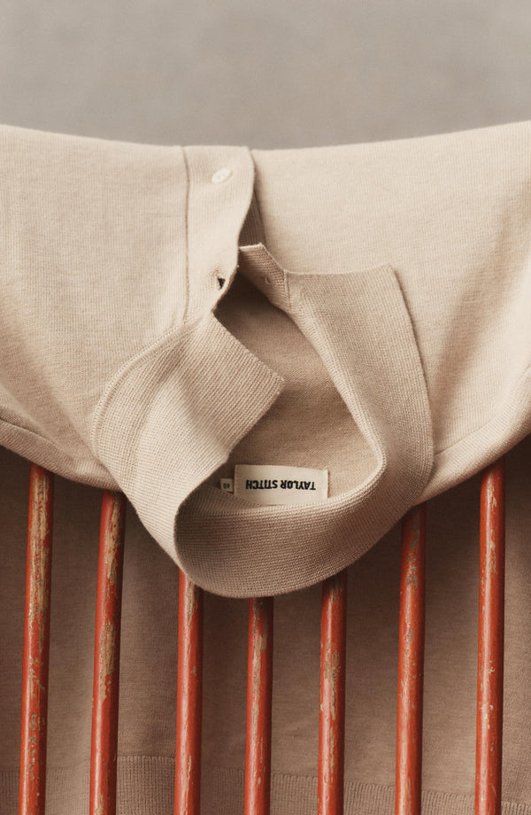editorial image of The Nichols Polo in Sable Cotton Cashmere on a chair