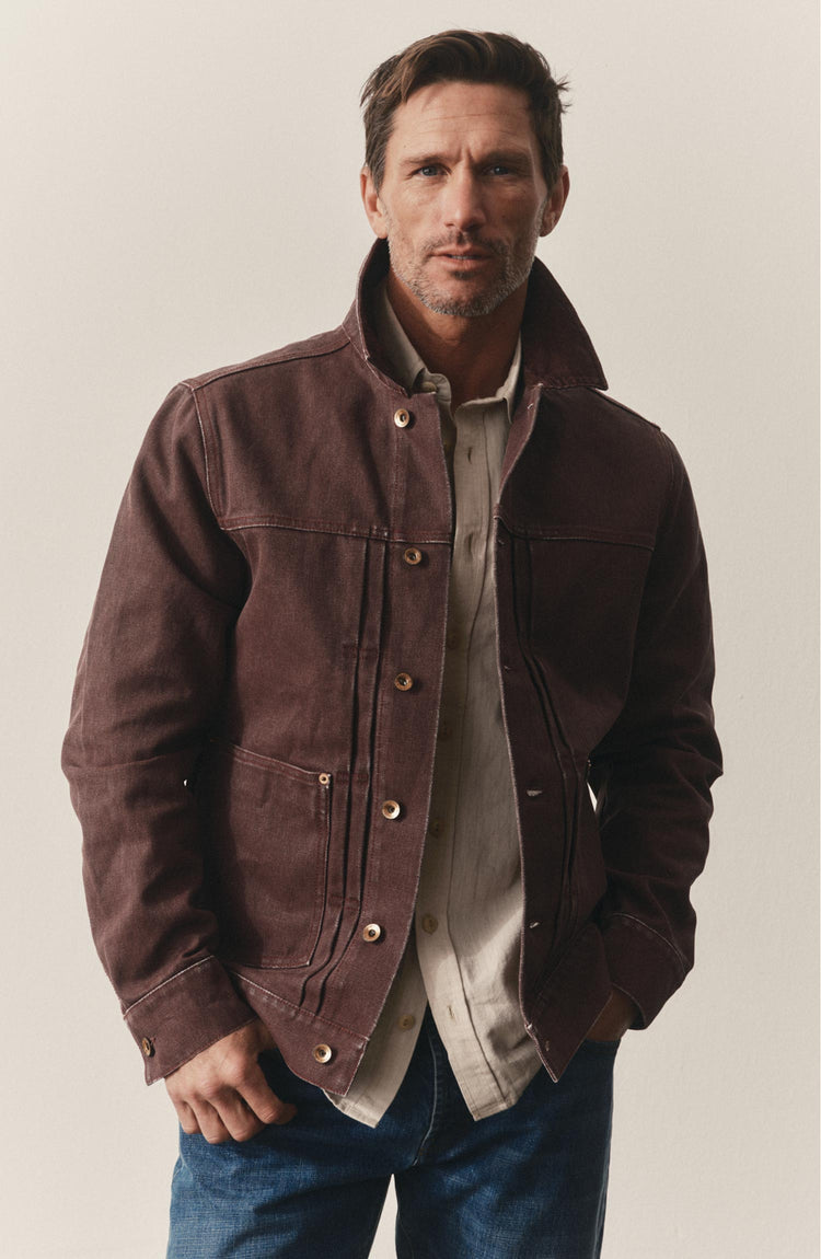 fit model posing in The Ryder Jacket in Burgundy Chipped Canvas