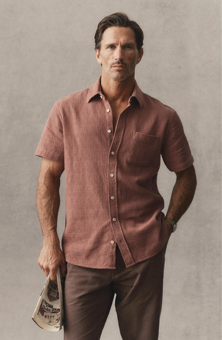 fit model posing in The Short Sleeve California in Redwood Hacci