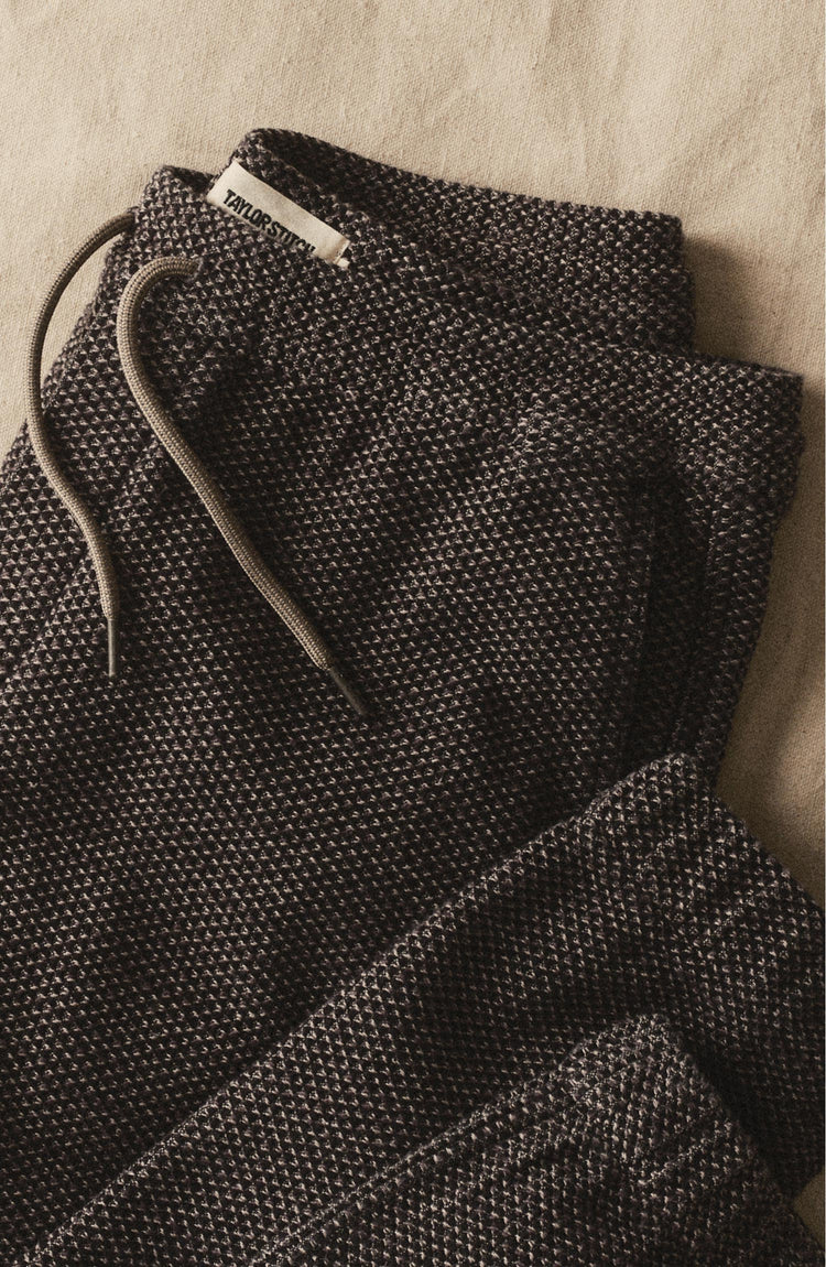 editorial flatlay of The Apres Pant in Charcoal Sashiko