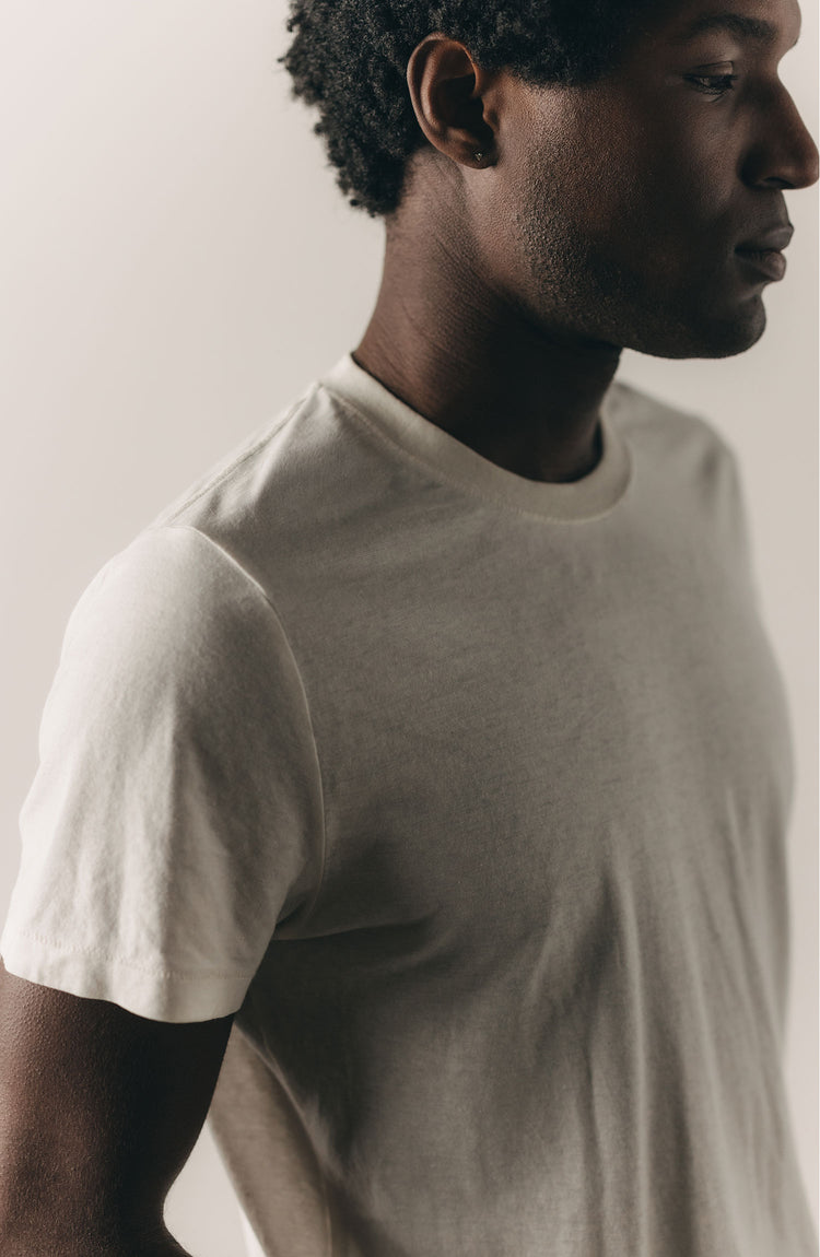 fit model posing in The Cotton Hemp Tee in Vintage White