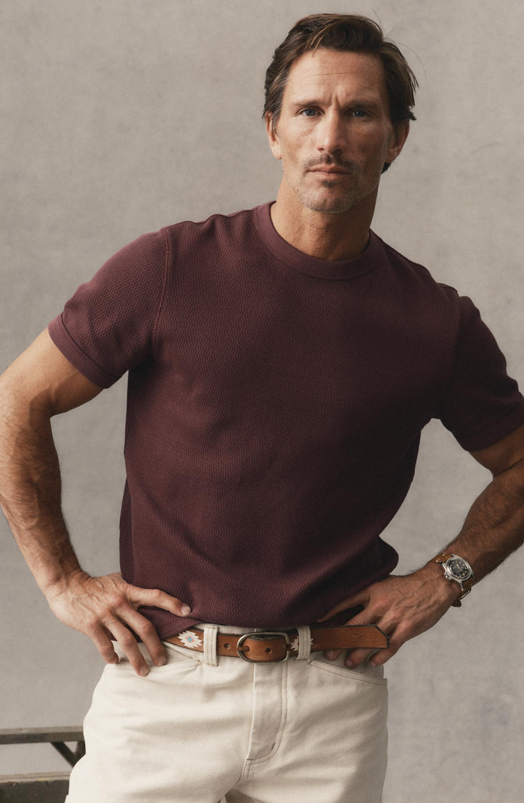 fit model walking wearing The Organic Cotton Short Sleeve Crew in Burgundy Waffle