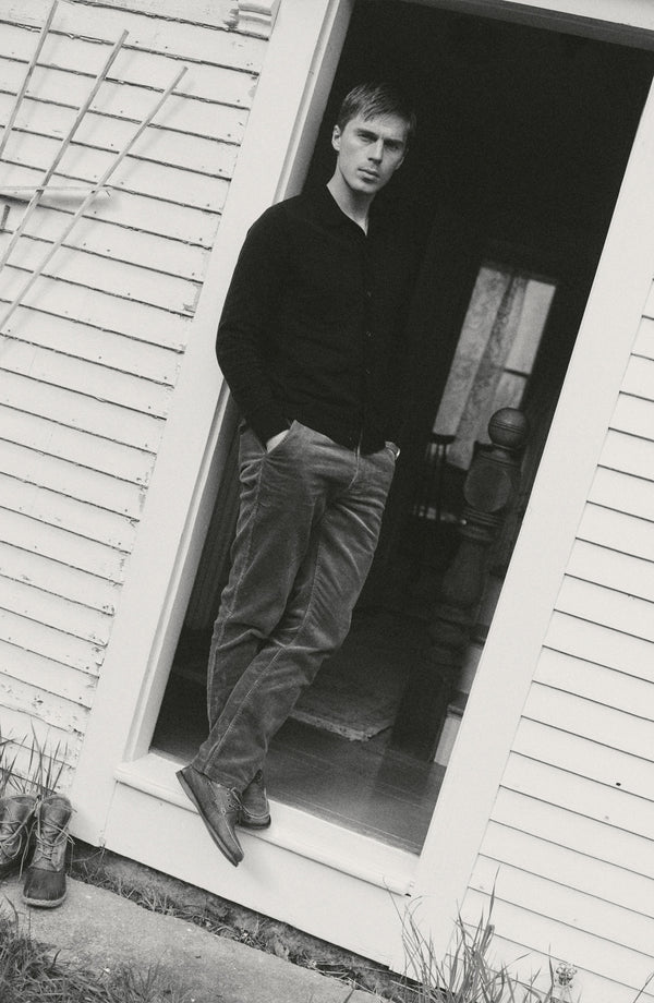 fit model showing off the bottom cuffs on The Carnegie Pant in Bourbon Corduroy