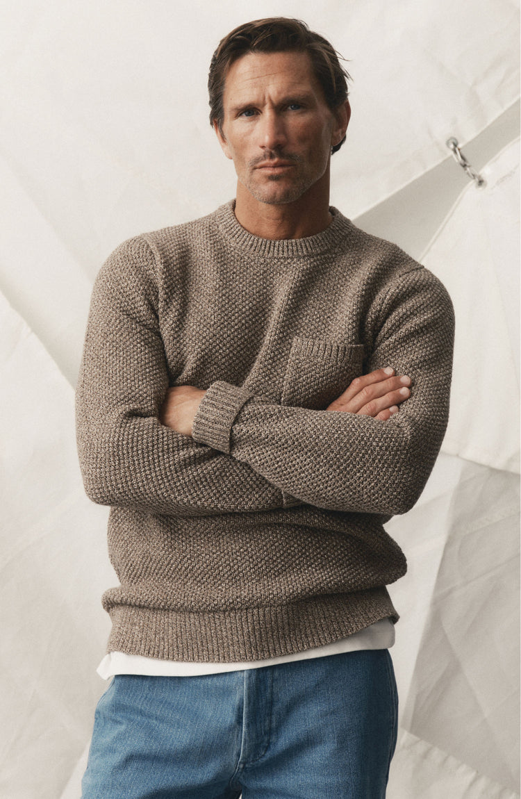 fit model posing in The Crawford Crew Sweater in Coffee Twist