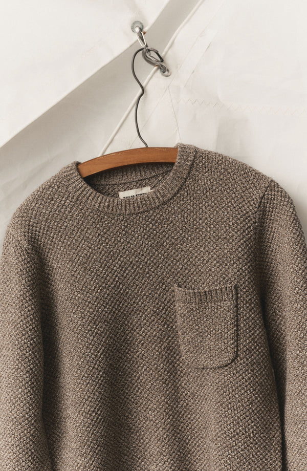 editorial image of The Crawford Crew Sweater in Coffee Twist hanging