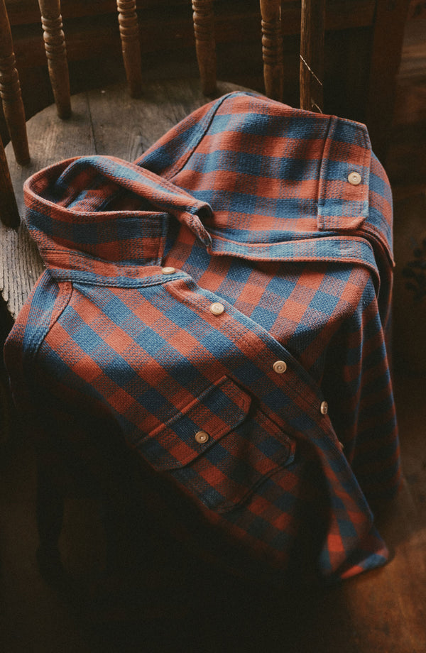 editorial flatlay of The Division Shirt in Sunset Check