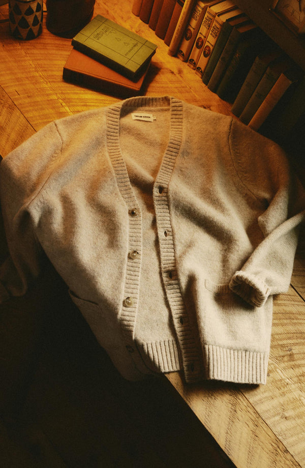 editorial flatlay of The Eastmoor Cardigan in Oatmeal Wool