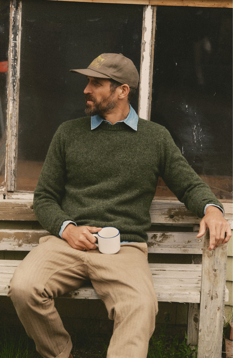 fit model posing in The Eastmoor Sweater in Spruce Wool