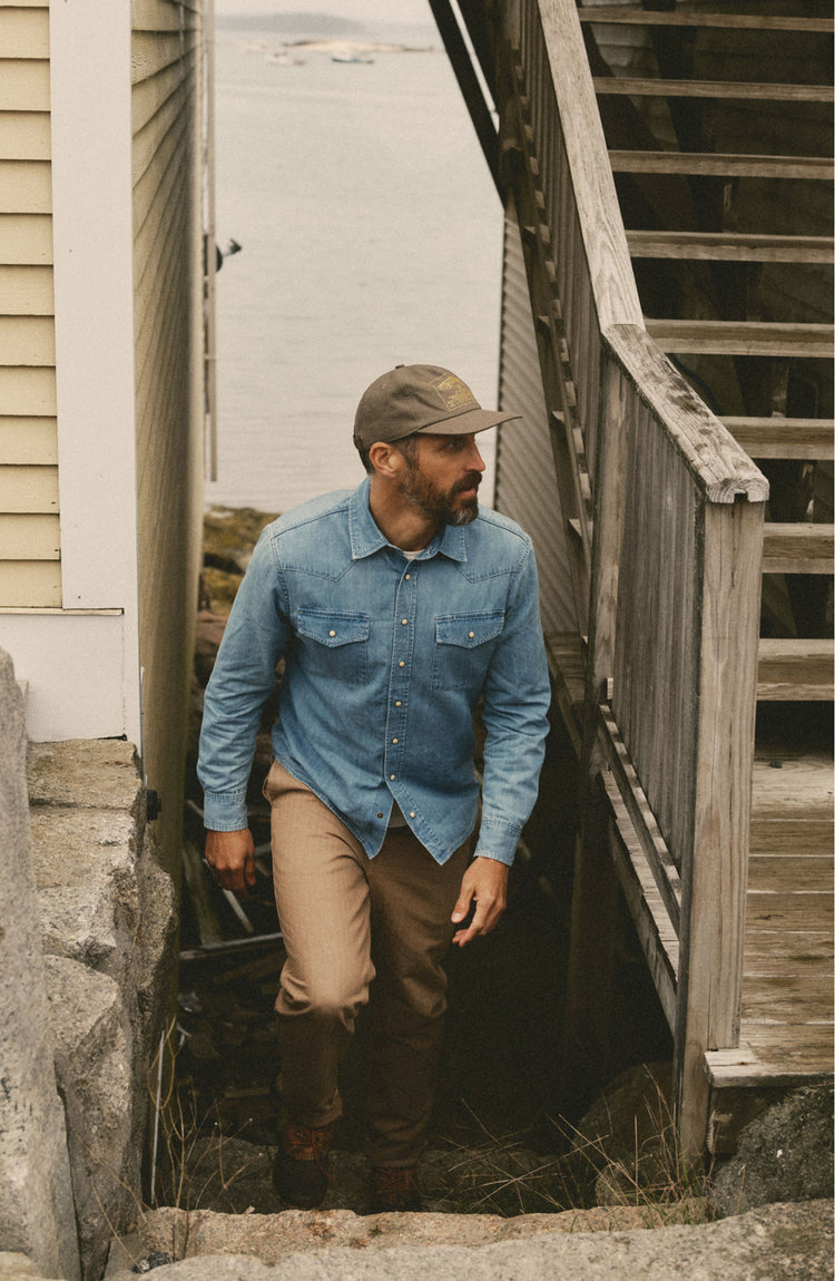 fit model walking wearing The Glacier Shirt in Washed Indigo Denim