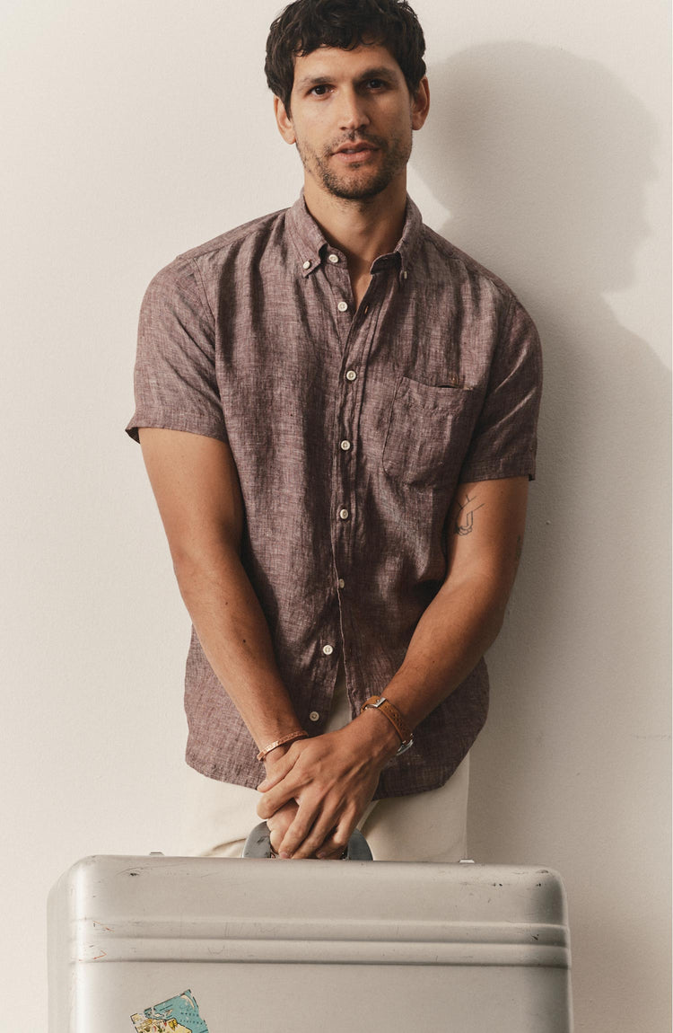 fit model posing in The Short Sleeve Jack in Burgundy Linen