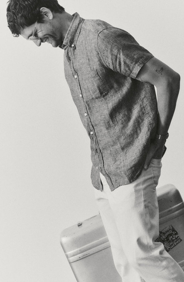fit model walking wearing The Short Sleeve Jack in Burgundy Linen