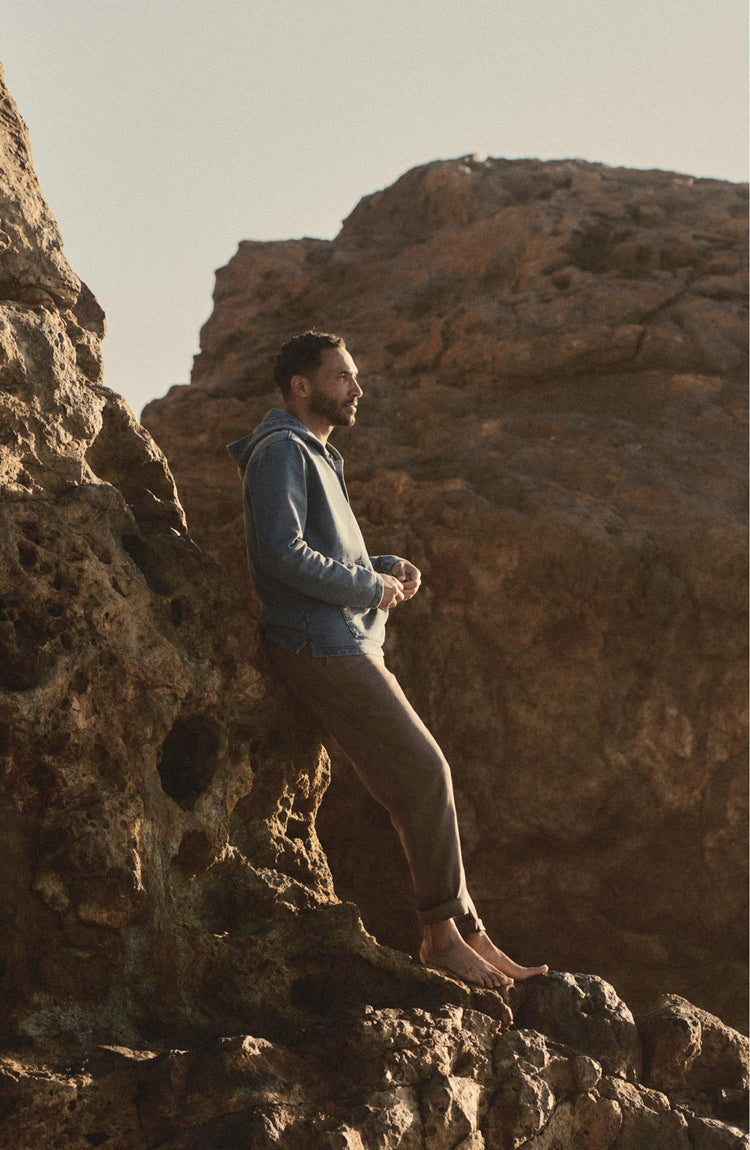 fit model posing in The Roamer Pant in Smoked Olive Broken Twill