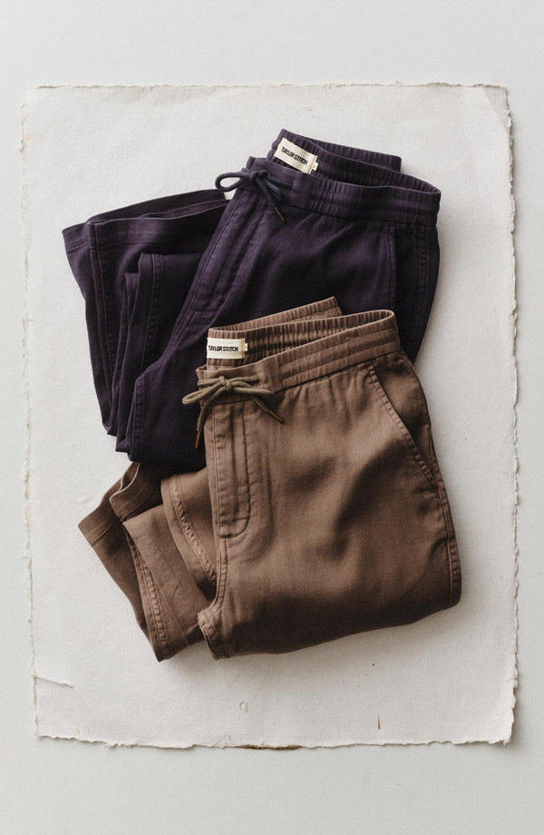 editorial flatlay of The Roamer Pant in Navy Broken Twill folded