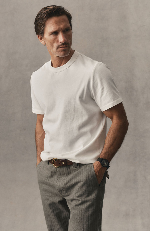 fit model showing off The Organic Cotton Shop Tee in White