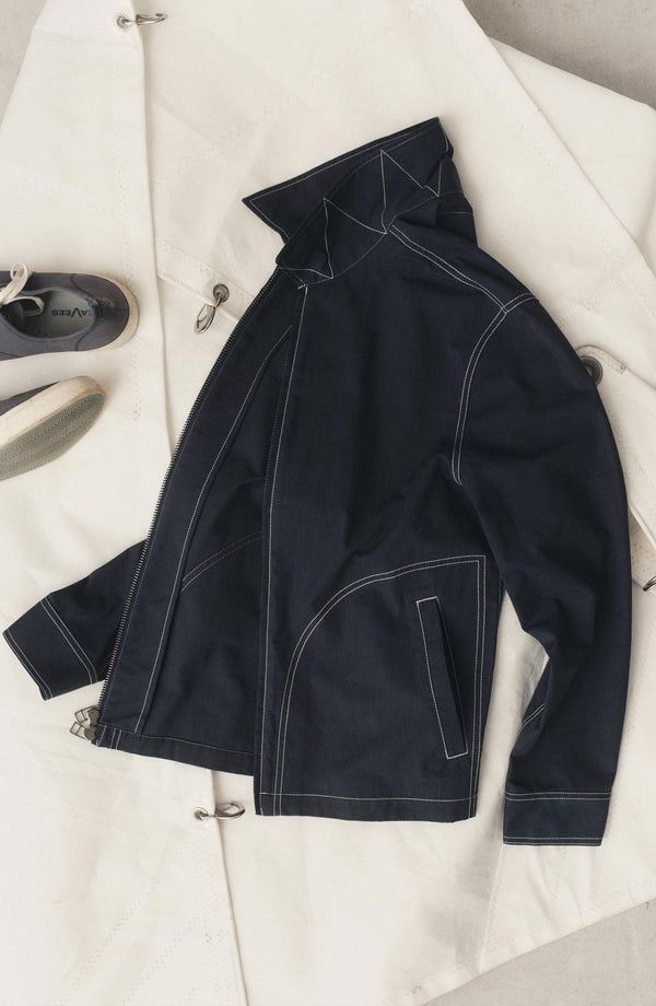 editorial flatlay of The Shore Jacket in Navy Twill
