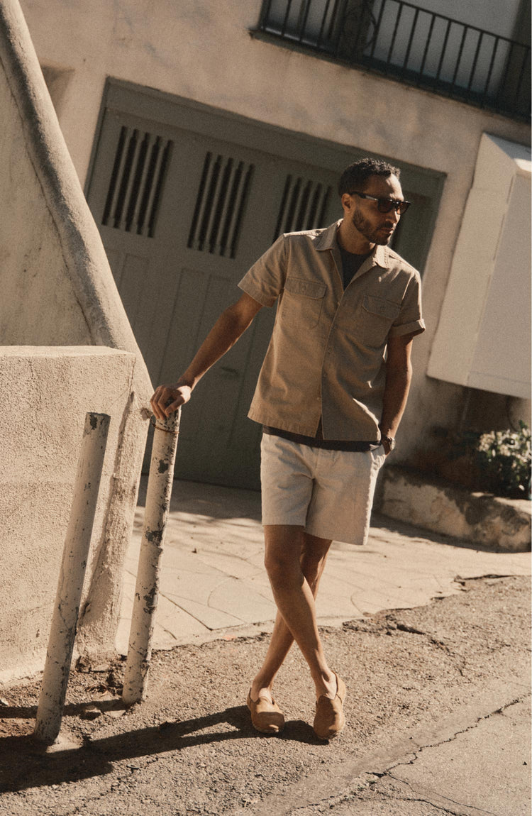 fit model posing in The Short Sleeve Mechanic Shirt in Khaki Ripstop